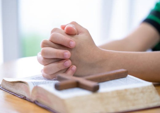 Praying hands.